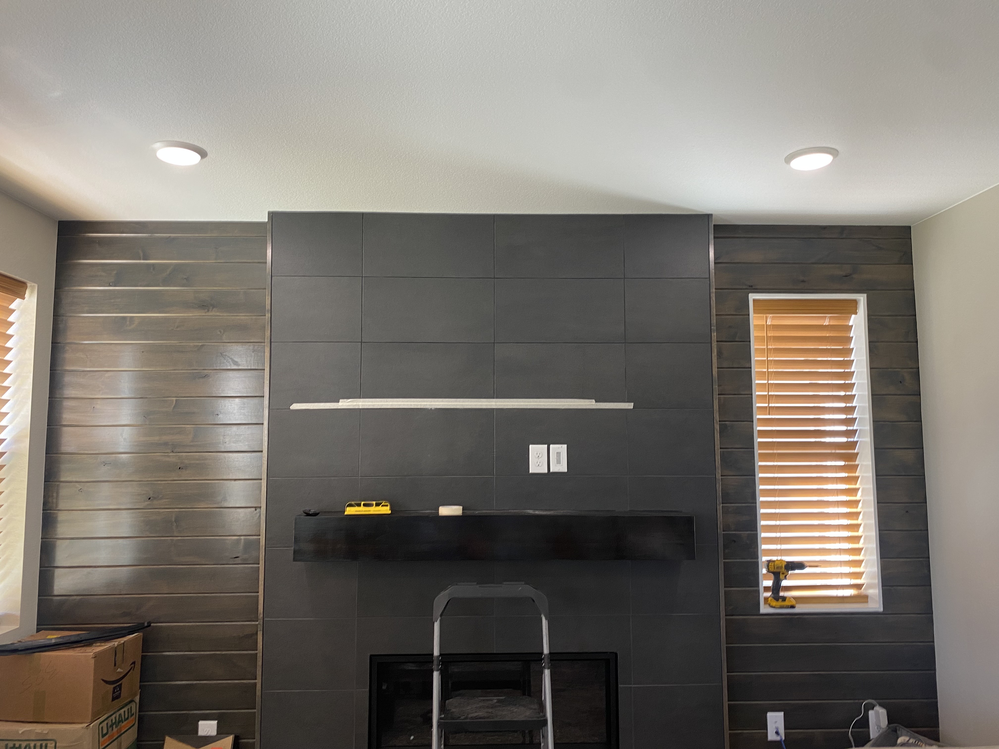 Before — empty tile fireplace wall ready for TV mount