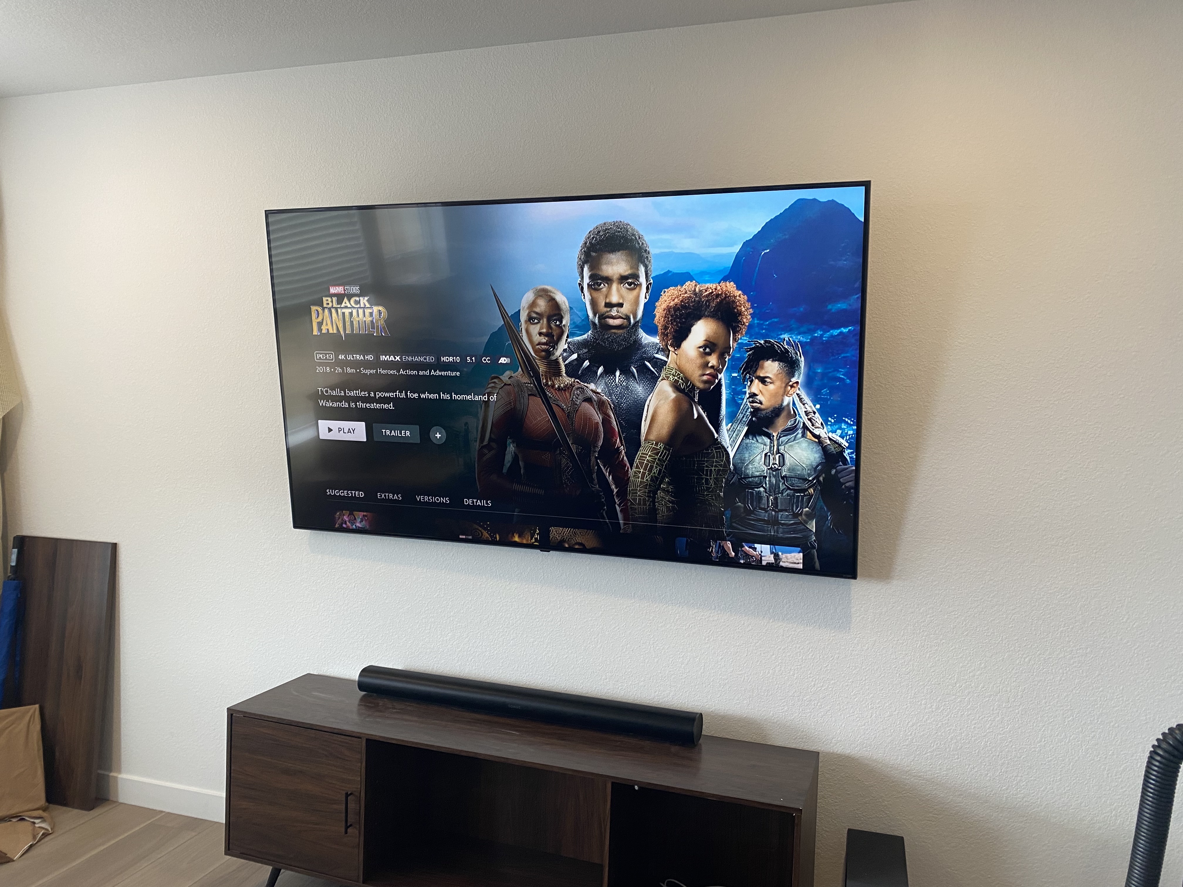 TV wall mount with soundbar, Black Panther on screen